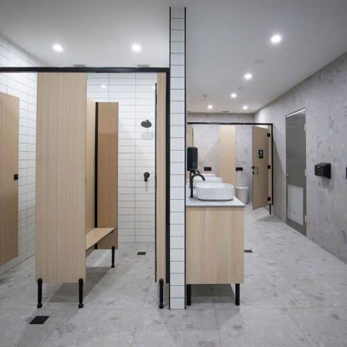 Durable compact laminate partitions designed for high-traffic commercial environments.